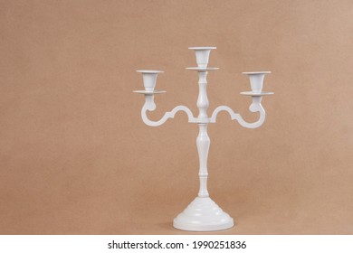 White Antique Classic Luxury Candle Holder On Bronze Background 