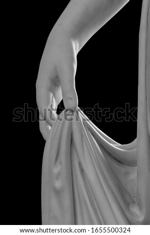 White antique marble stone statue detail of human hand