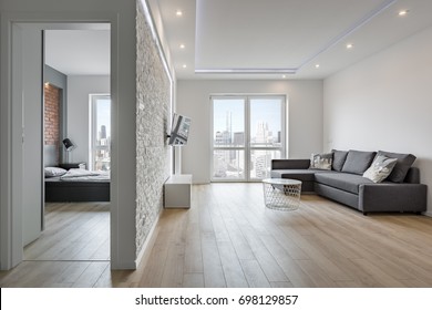 White Apartment With Brick Wall, Bedroom And Living Room