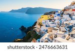 White architecture in Santorini island, Greece. Beautiful view of Oia town at sunset. Travel and vacation concept