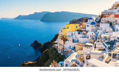 White architecture in Santorini island, Greece. Beautiful view of Oia town at sunset. Travel and vacation concept - Powered by Shutterstock