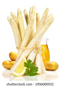 White Asparagus with new Potatoes and Butter isolated on white Background