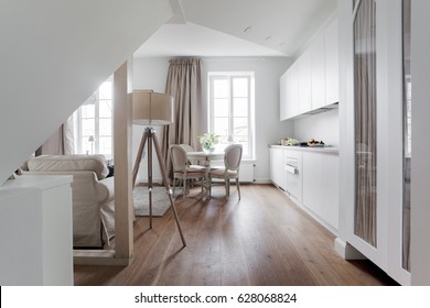 White Attic Apartment Interior With Shabby Chic Furniture