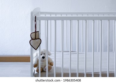white baby bed. Waiting for a baby - Shutterstock ID 1986305408