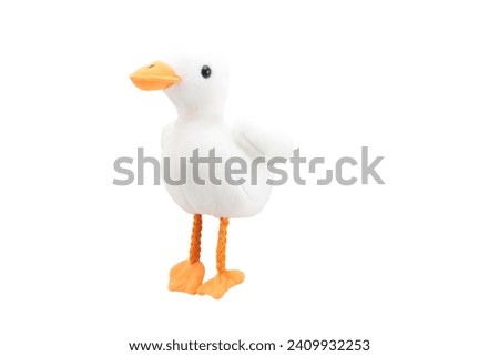 white baby duck plush stuffed  doll plaything for kids isolated on white background. child soft toys collection. top view character puppet. white duckling.