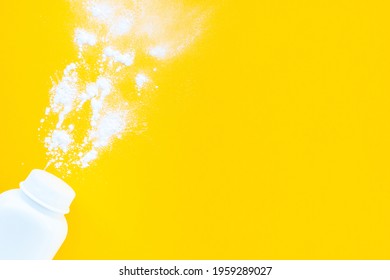 White Baby Powder Jar On Yellow Background, Flat Layout, Top View, Copy Space, Mockup. Minimalist Concept Of Baby Hygiene.