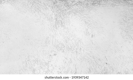 White background of concrete floor with rough scratches abstract texture in grayscale.