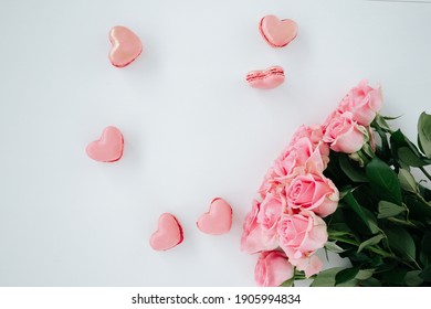 White Background With Heart Shaped Macaroons And Pink Roses For Valentines Day, Mothersday, Holiday, Gift 