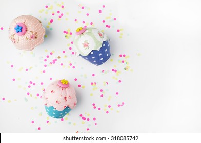 White Background With Party Accessories. Invitation Mockup. Confetti And Muffins. Cake