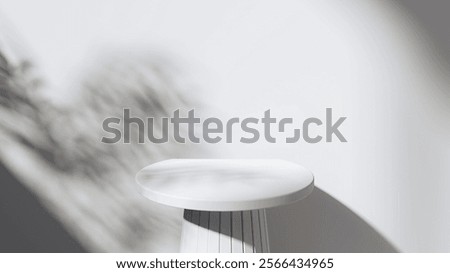 White background for product presentation. White platform. A wall with a shadow cast by a plant. Sunlight. Mock up. Podium.  Pedestal