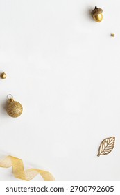 White background with a smooth texture. The background features gold accents and a minimalist style. Festive Christmas Holiday design background.