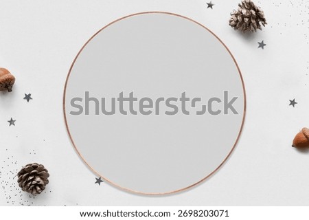 White background with a smooth texture. White background features scattered pinecones and stars for a festive touch. Minimalist elegant white background with pine cones.