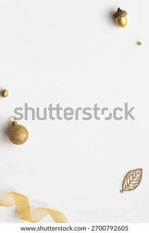 White background with a smooth texture. The background features gold accents and a minimalist style. Festive Christmas Holiday design background.