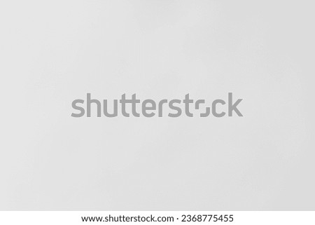 The white background of a synthetic fiber sheet using a low ISO maximum zoom lens under rainy light.
