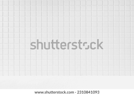 White background with white tiny tile wall, wood floor as abstract interior for display, presentation of cosmetics products, goods, design. Simple stage in classical mediterranean style.