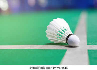 White Badminton Shuttlecock On White Line On Green Background Badminton Court Indoor Badminton Sports Wallpaper Or Background With Copy Space