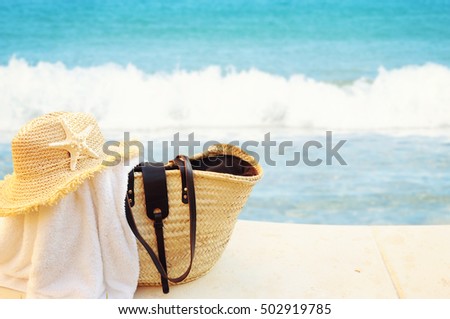 White bag on sea backround, Concept of summer traveling 