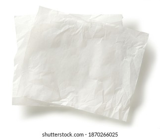 white baking paper sheets isolated on white background, top view
