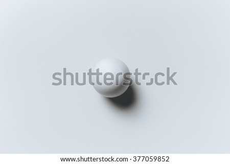 White ball on the white background in center. Design, visual art, minimalism