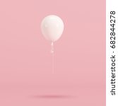 White balloon on pink background. minimal concept idea.