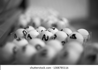 white balls with numbers for the game of lottery.