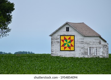 White Barn In Iowa With Barn Quilt