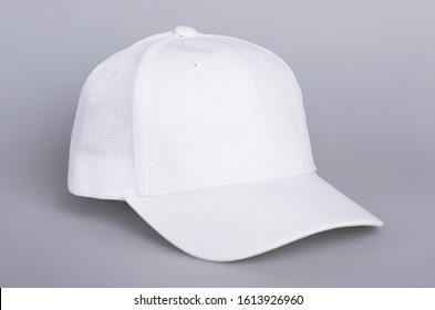 White baseball cap mockup. Blank trucker hat isolated on gray background