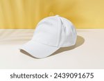 White Baseball Cap on Table