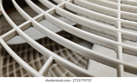 white basic box fan cover with a geometric pattern. heat wave, or design element. abstract background banner.