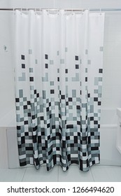 White Bathroom With Black And White Shower Curtain.