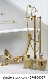 White Bathroom Interior With Gold Plated Bath (tub) On Carpet, Aromatherapy