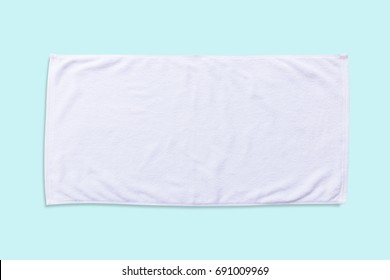 White Beach Towel Mock Up Isolated With Clipping Path On Pastel Blue Background, Flat Lay Top View