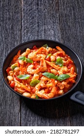 White Bean, Tomato, Fennel And Shrimp Skillet Dinner On Dark Wooden Table, Italian Cuisine, Vertical View From Above