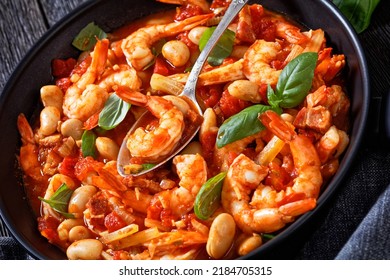 White Bean, Tomato, Fennel And Shrimp Skillet Dinner On Dark Wooden Table, Close-up