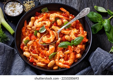 White Bean, Tomato, Fennel And Shrimp Skillet Dinner On Dark Wooden Table