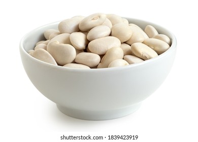 White beans in a white ceramic bowl isolated on white.