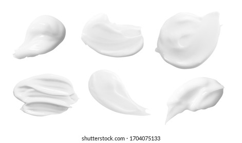 White beauty cream, lotion smears set. Cosmetic creme swatches isolated on white background. Skin care product smudge sample. Hand cream texture close up