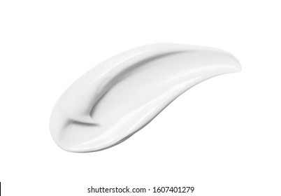White beauty cream smear smudge isolated on white background. Cosmetic skincare product texture. Face cream, body lotion swipe swatch