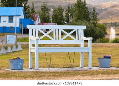 White Bench in Iceland park. Outdoor view