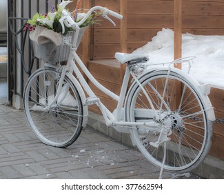 white bike with basket