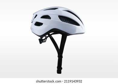 White bicycle helmet isolated on white background. Side view of bicycle helmet