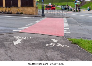 White Bike Path Sign On Asphalt.