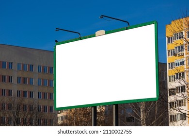 White Billboard Along The Highway On A Winter Snow Day. Background For Design And Advertising. 