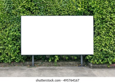 White Billboard Mockup On Spring Summer Green Leaves Background.