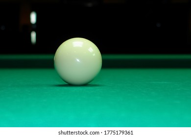 White Billiard Ball Without A Number, Close-up, On A Pool Table, Side View