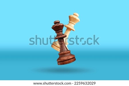 White and black chess queen floating above the blue table. Advertising of a chess school with flying shapes. High quality photo