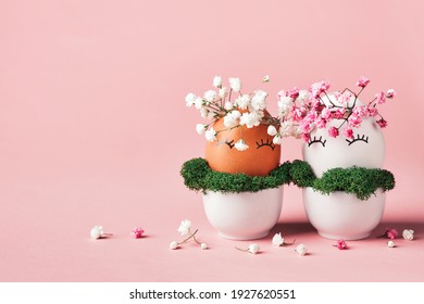 White And Black Easter Eggs With Natural Flowers Wreath. Zero Waste Easter Concept. Pink Easter Background With Copy Space. Racial Equality Symbol