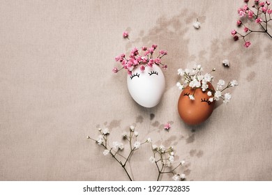 White And Black Easter Eggs With Natural Flowers Decor. Zero Waste Easter Concept. Racial Equality Symbol. Sunlight And Floral Shadows.