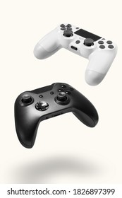 White and black game controllers on white background - Shutterstock ID 1826897399