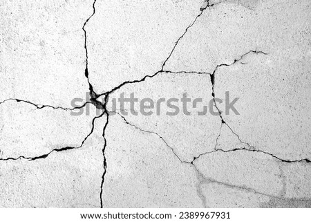 White black grey wall, floor with cracks, texture background, a hole in the concrete wall